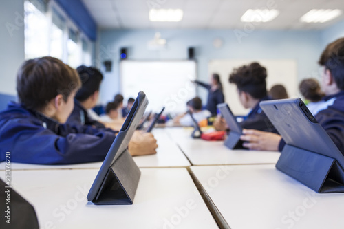 children study in class with their tablet