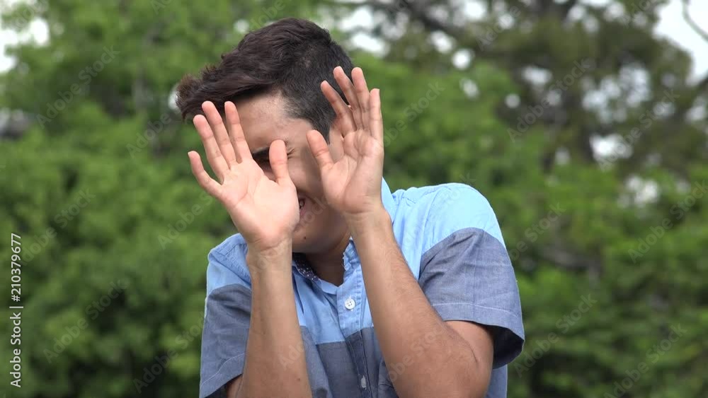 Fearful Male Hispanic Teenager Fearful Male Hispanic Teenager