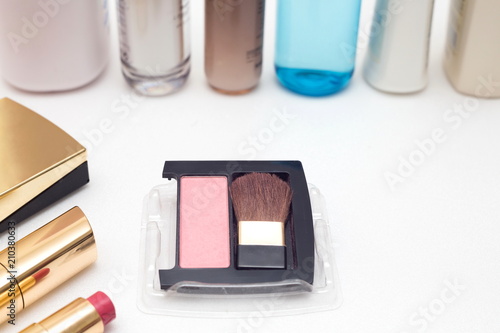 Cosmetic brushes on table.