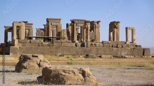 A steady shot of the tall posts from the city of persepolis. photo