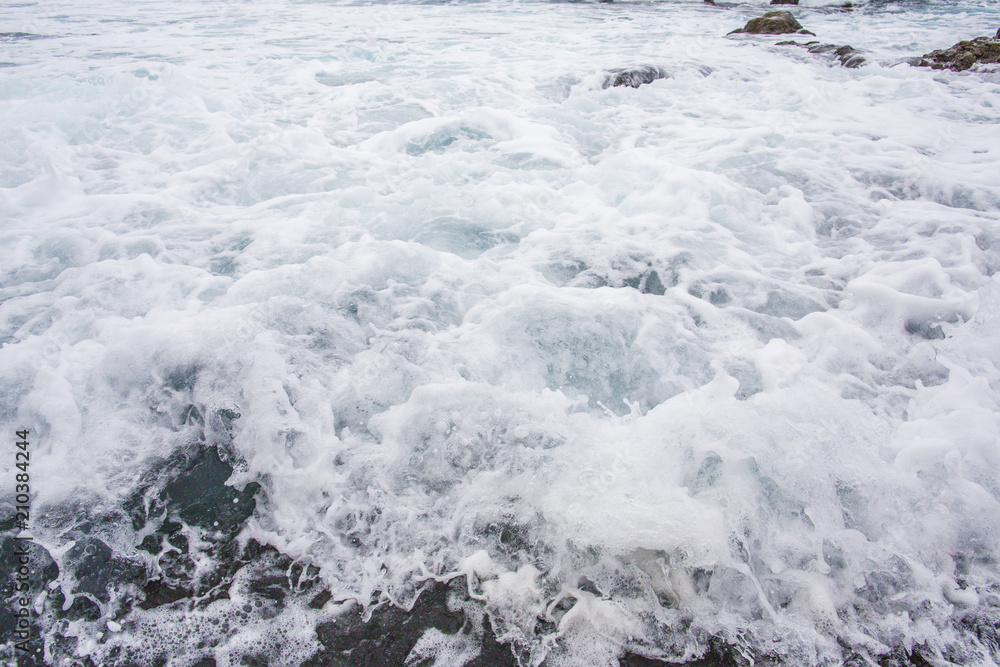 Ocean wavy surface close up. sae water texture background, motion blur. .Tenerife, Puerto De La Cruz. Ocean wavy surface close up. sae water texture background, motion blur. .Tenerife, Puerto De La Cruz.