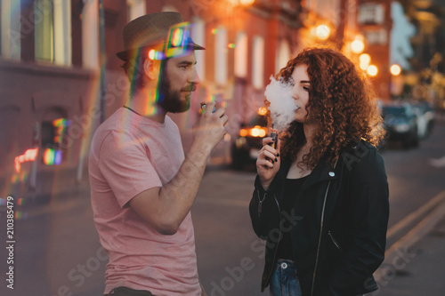 Quadro su tela Loving couple of hipsters on date