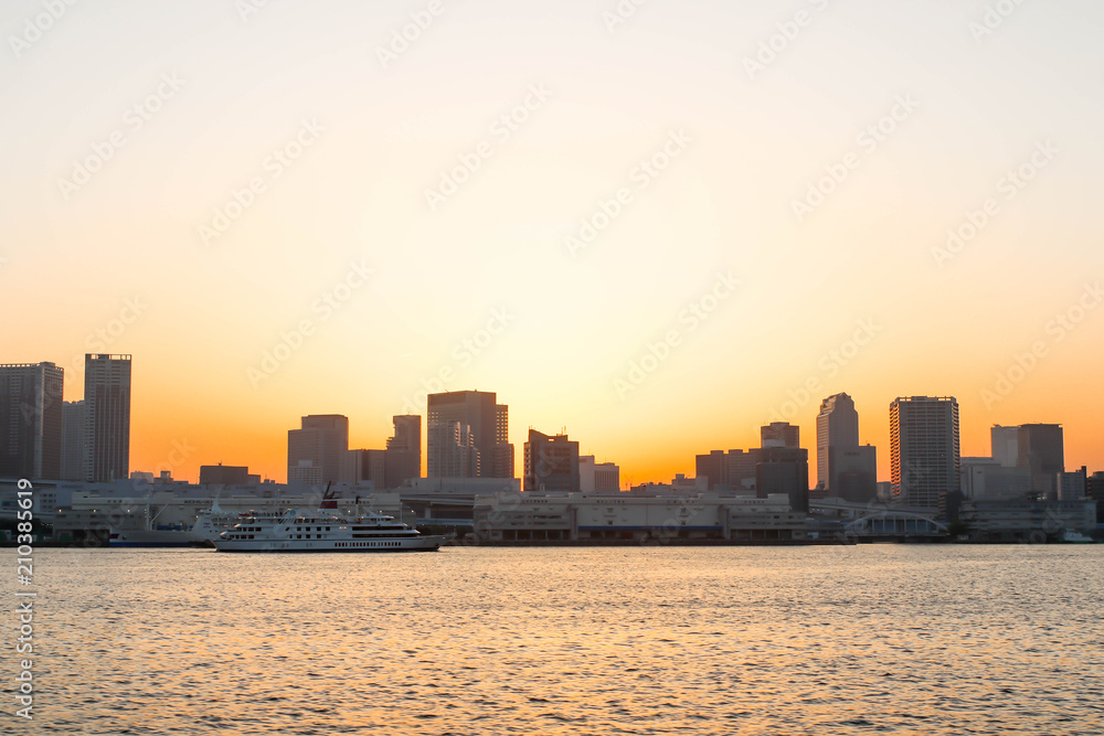 Landscape View of sunset and one boat at sumida river viewpoint to see boats in tokyo