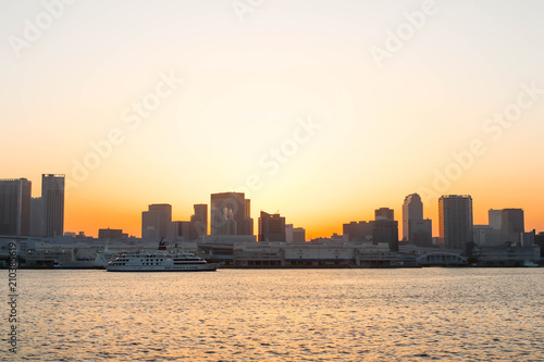 Landscape View of sunset and one boat at sumida river viewpoint to see boats in tokyo