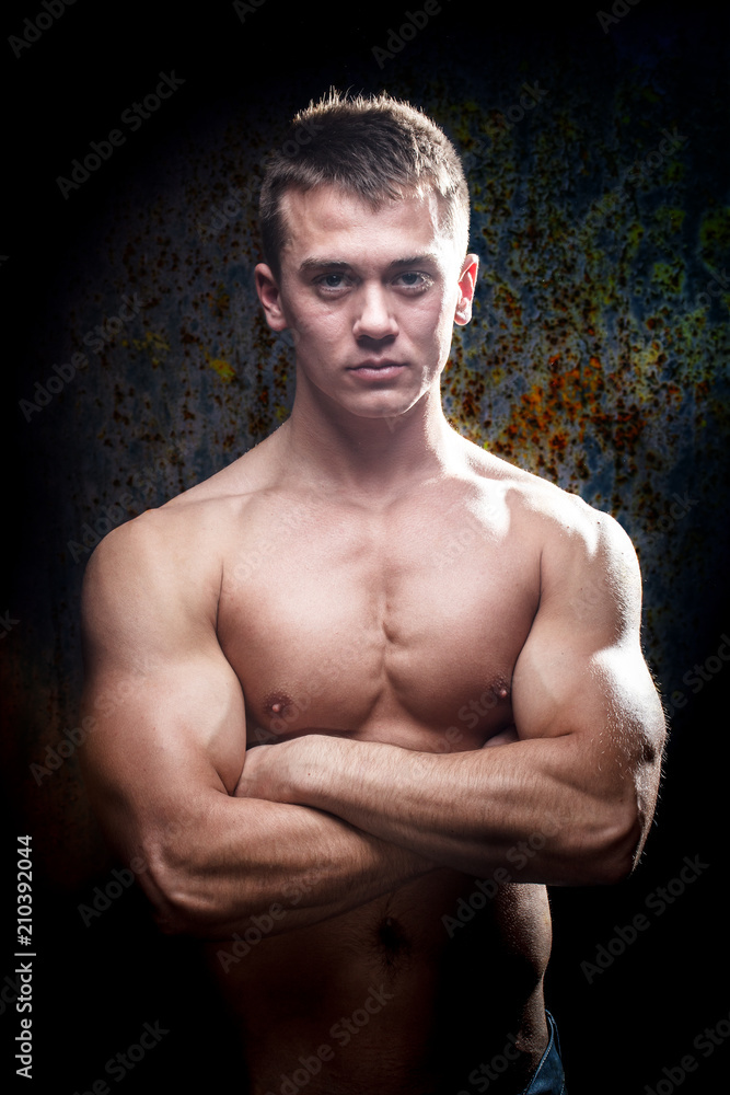 Portrait of a shirtless muscular young man Portrait of a shirtless muscular young man