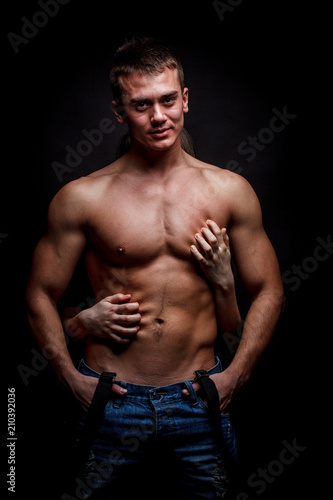 Shirtless man and female hands