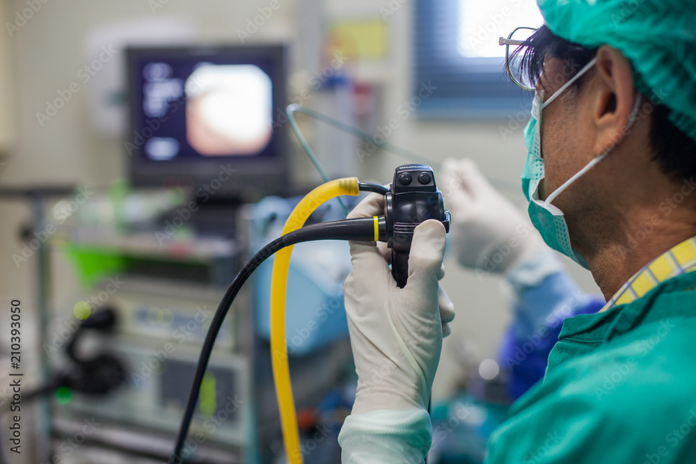 Doctor with modern medical equipment to treatment patient in hospital. Doctor with modern medical equipment to treatment patient in hospital.