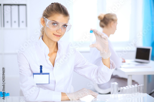 Female scientific researcher or blood test assistant in laboratory. Medicine concept