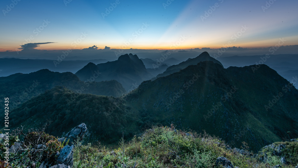 Obraz premium Beautiful mountains landscape of Doi Luang Chiang Dao at sunset, is a 2,175 m high mountain in Chiang Dao District of Chiang Mai Province, Thailand.