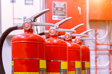 Red tank of fire extinguisher Overview of a powerful industrial fire extinguishing system.
