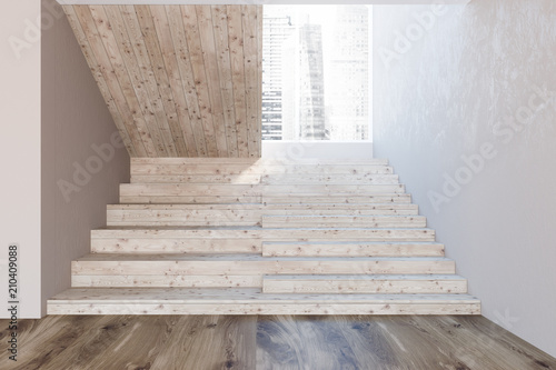 Wooden stairs in a white wall hall, picture