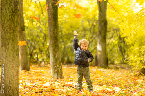 A boy in the autumn park © Анастасия Охотникова