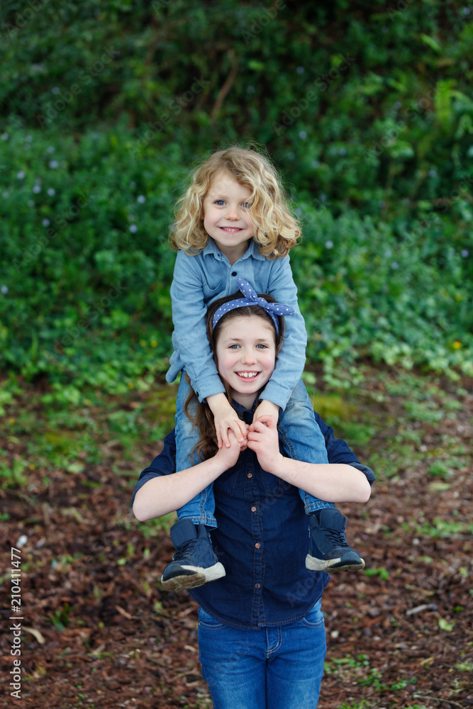 Happy children a park enjoying a beautiful day Happy children a park enjoying a beautiful day
