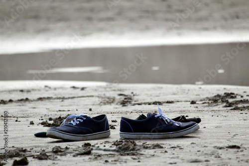 Lost shoe on the beach