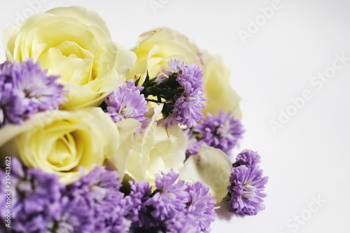 White roses and Purple Marguerite Daisy flowers isolated on white background. Use for Valentine day and ultra violet for 2018 concept background.Copy space © cocorattanakorn