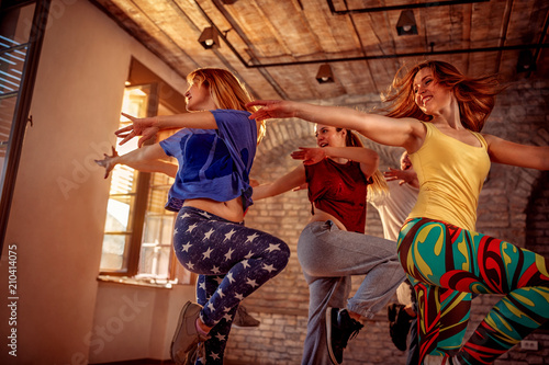Passion dance team - female dancer exercising dance training in studio