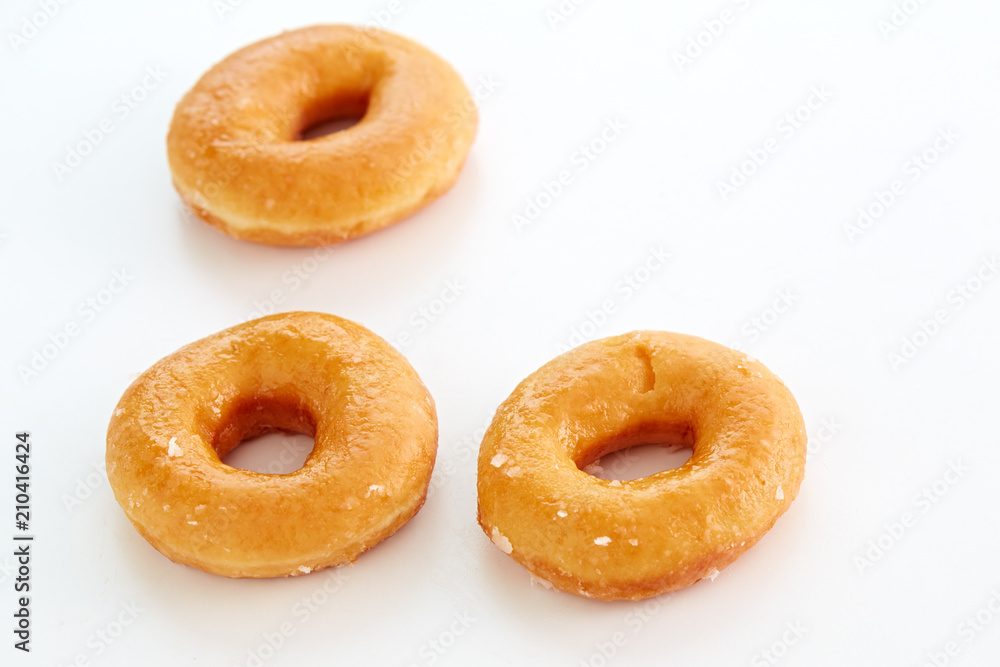 Glazed donutson a white Background Glazed donutson a white Background