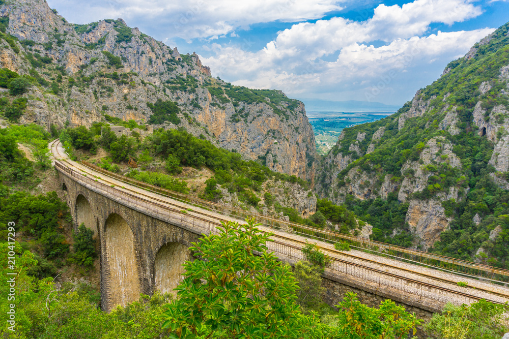 The old railway bridge of the Asopos river near village Iraklia at national park of Oiti in Central Greece