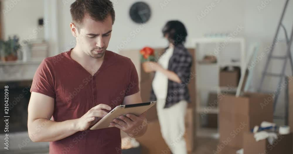 Young man order new furniture in an online store Young man order new furniture in an online store