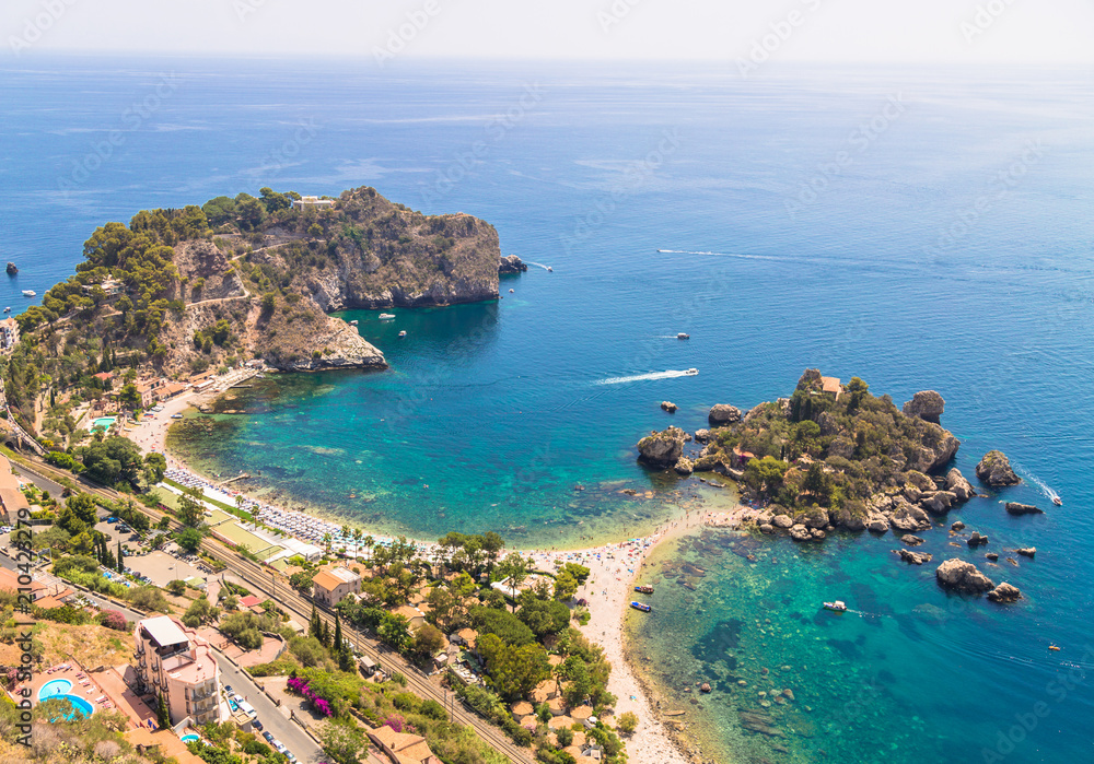Aerial view of island and Isola Bella beach and blue ocean water in Taormina, Sicily, Italy Aerial view of island and Isola Bella beach and blue ocean water in Taormina, Sicily, Italy