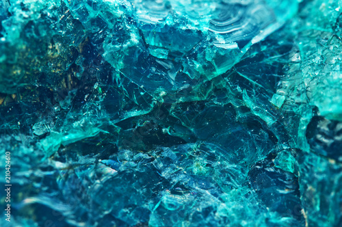 Crystal stone. Beautiful natural turquoise background. Macro. Extreme closeup beautiful jewel background. Unique macro photo