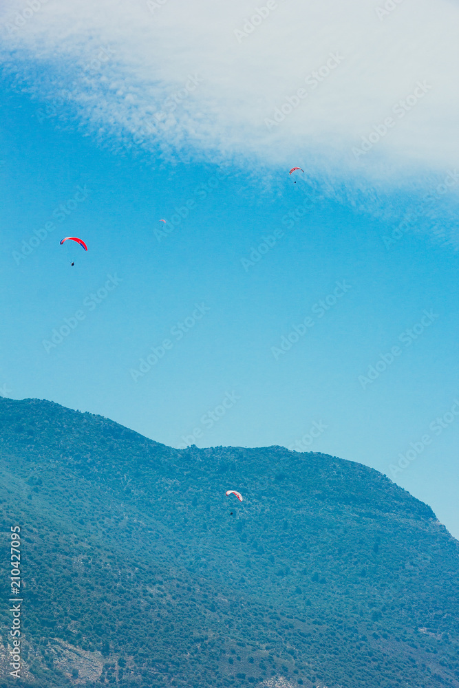 Paragliding in sunny weather on Oludeniz beach, Fethiye, Turkey – 07 Jun 2018 Paragliding in sunny weather on Oludeniz beach, Fethiye, Turkey – 07 Jun 2018