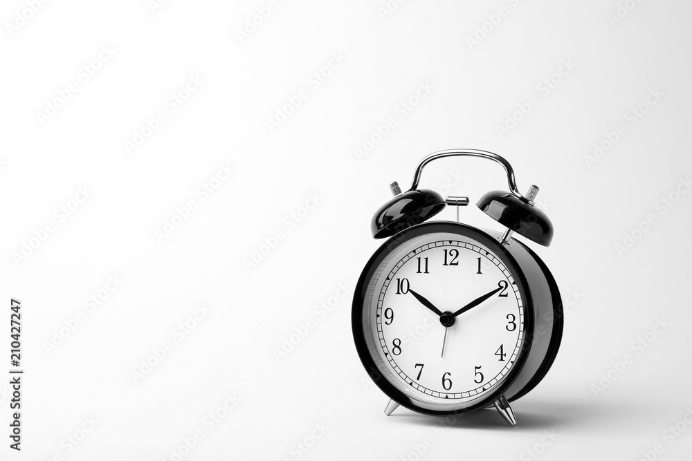 Alarm clock on white background. Time concept Alarm clock on white background. Time concept