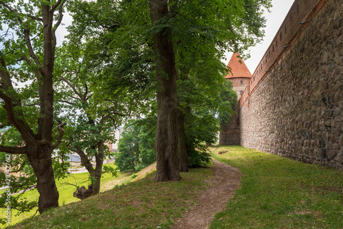 Pathway along gothic castle in Bytow. Poland
