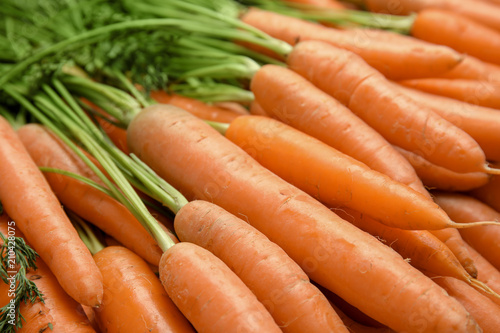 Ripe carrots as background, closeup. Healthy diet