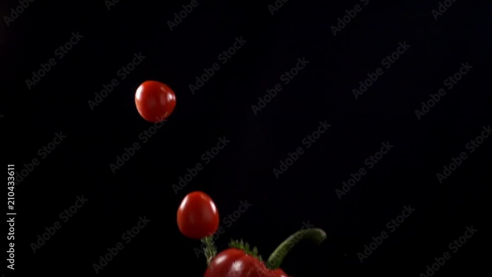 Fresh vegetables frozen in mid-air. Shooted in super slow motion Fresh vegetables frozen in mid-air. Shooted in super slow motion