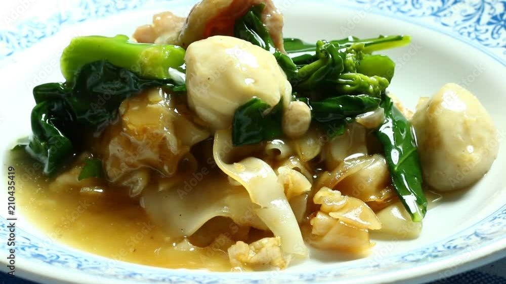 Fried noodle  with pork and kale or Radna, Thai food