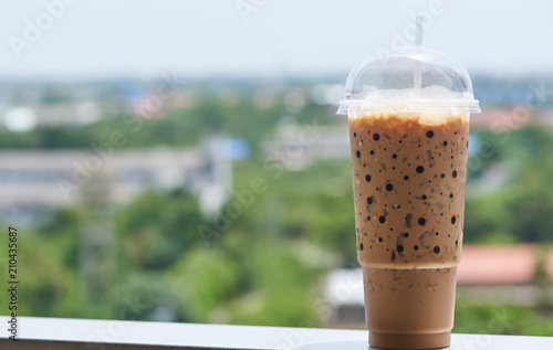 A cup of iced coffee in a sunny day © Teeradej