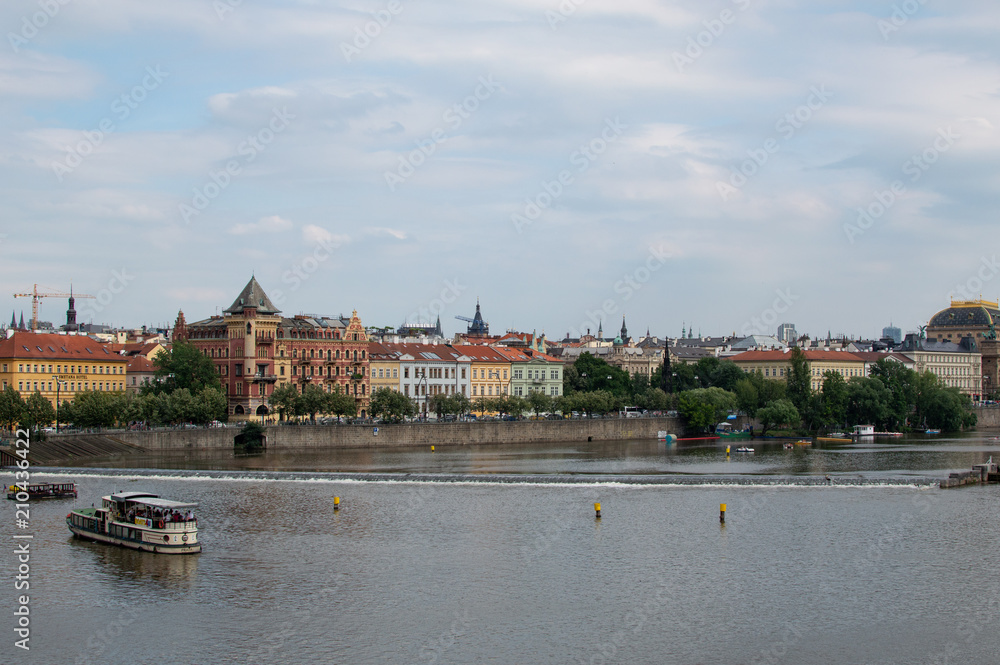 Obraz premium Prague across the Valtava