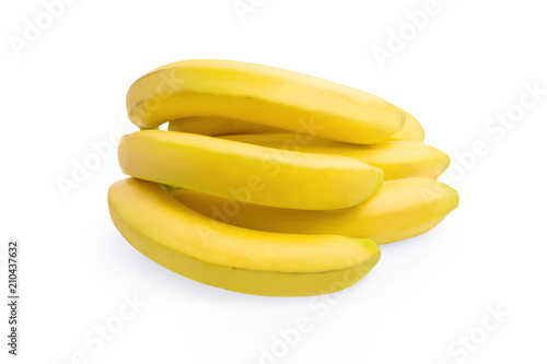 A bunch of ripe bananas lies on a white background, isolated.