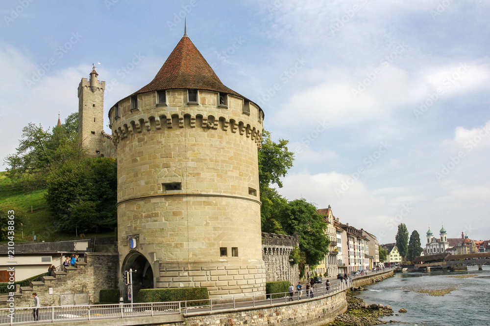 Old city entrance tower and city wall of Lucerne, Switzerland. 