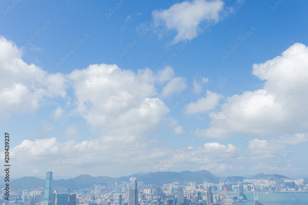 Highrise modern buildings with blue sky in the city at Victoria's Peak, Hong Kong Highrise modern buildings with blue sky in the city at Victoria's Peak, Hong Kong