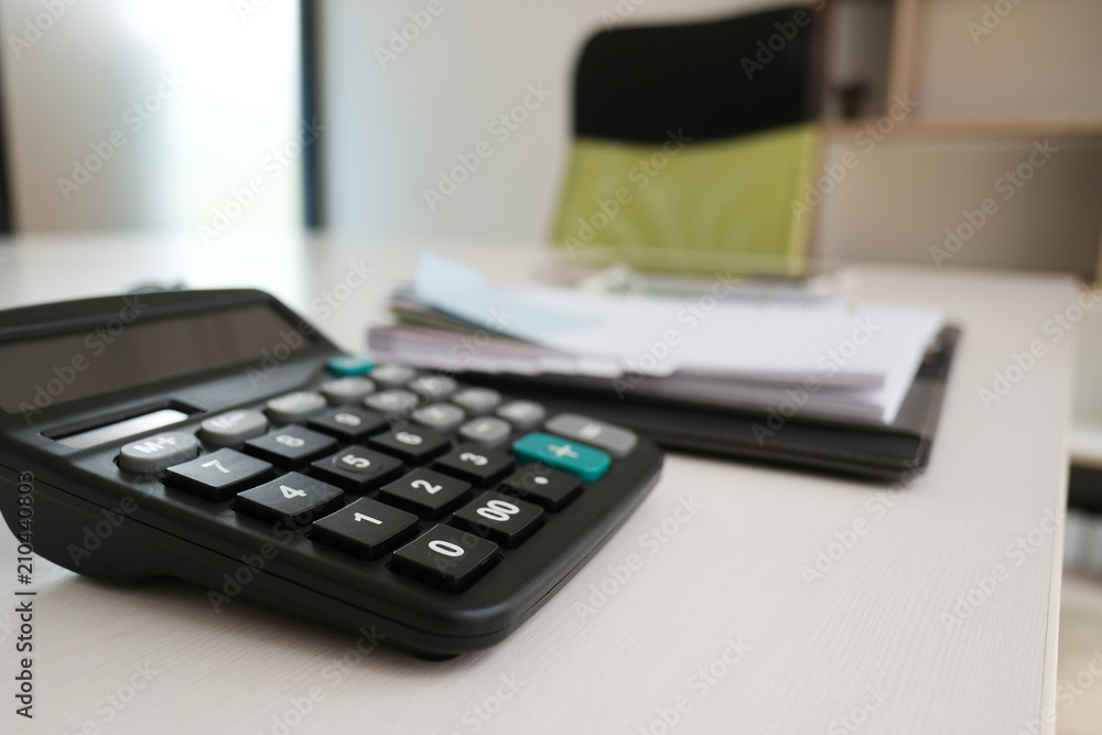 calculator, notebook on accountant desk at workplace. business concept calculator, notebook on accountant desk at workplace. business concept