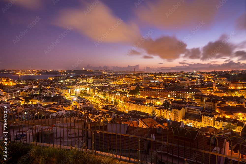 Twilight city view of Lisbon from the Nossa Senhora do Monte belvedere, Portugal