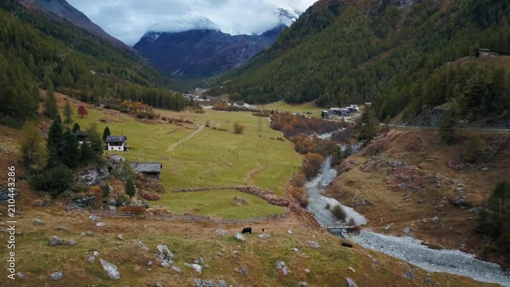 La Gouille Switzerland aerial view. Flying above valley in the Swiss alps in fall. 4k drone footage of picturesque mountain village in autumn. La Gouille Switzerland aerial view. Flying above valley in the Swiss alps in fall. 4k drone footage of picturesque mountain village in autumn.