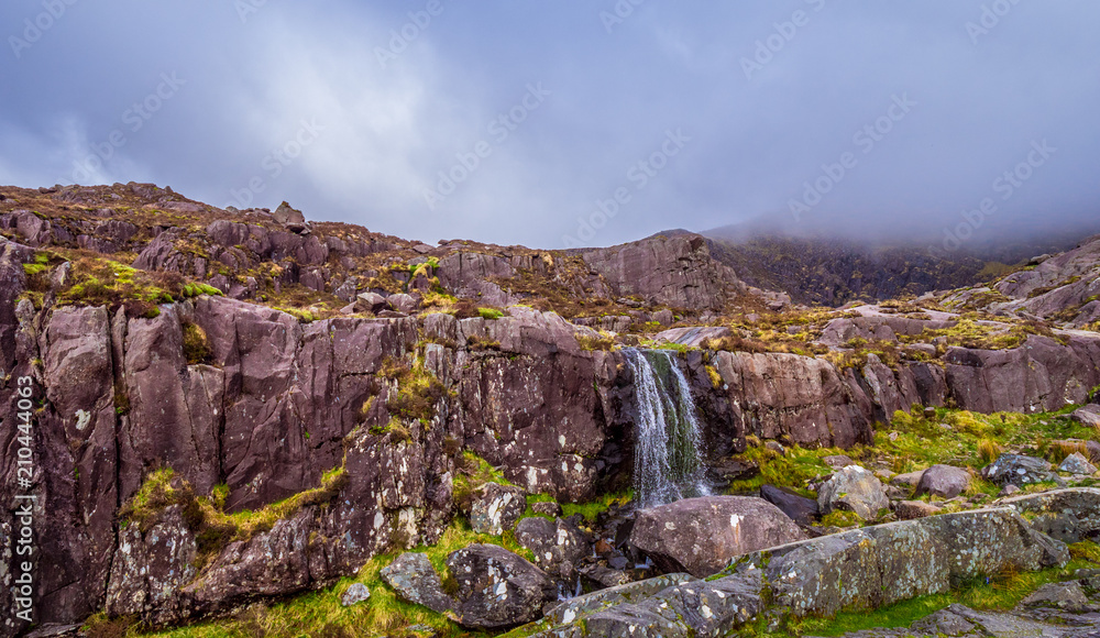 The Connor Pass Waterfall - popular landmark on Dingle Peninsula Ireland