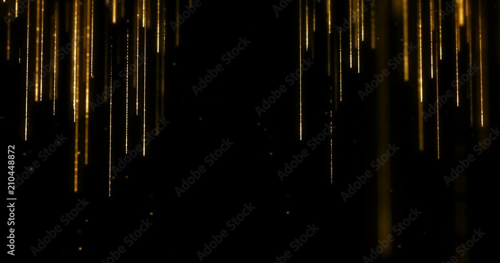 golden glitter sparkle particles stream bokeh flowing from top and down on black background, gold christmas and happy new year holiday concept golden glitter sparkle particles stream bokeh flowing from top and down on black background, gold christmas and happy new year holiday concept