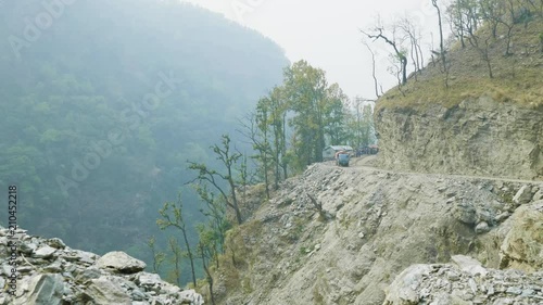 Backpackers on the alpine path on the Manaslu mountain circuit trek in Nepal. photo