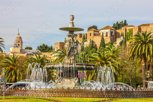 Malaga, Spain: Fountain and Alcazaba fortress.