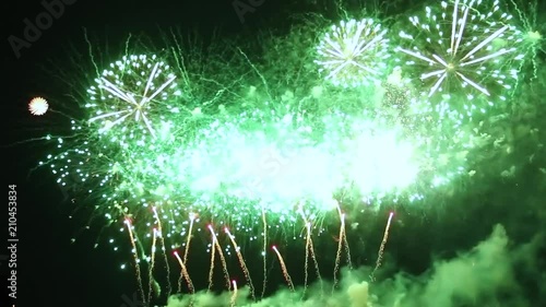 Spectacular fireworks show erupting from fountains in the bottom of the scene
