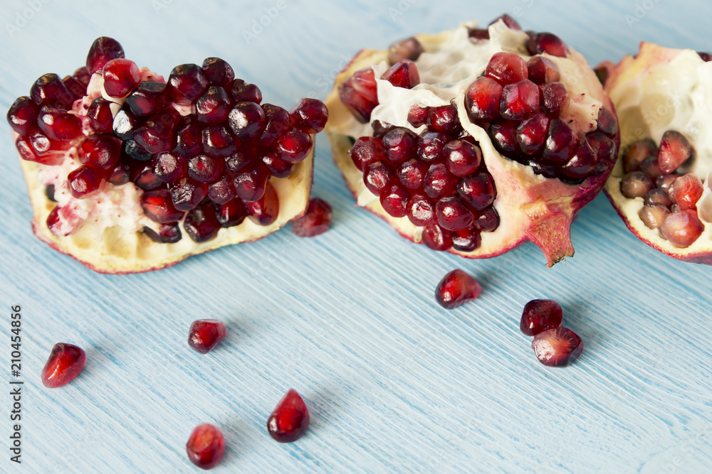 pomegranate on blue background pomegranate on blue background