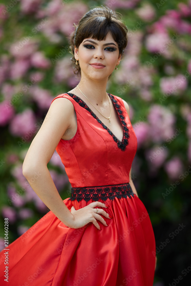 Beautiful young lady in red dress Beautiful young lady in red dress