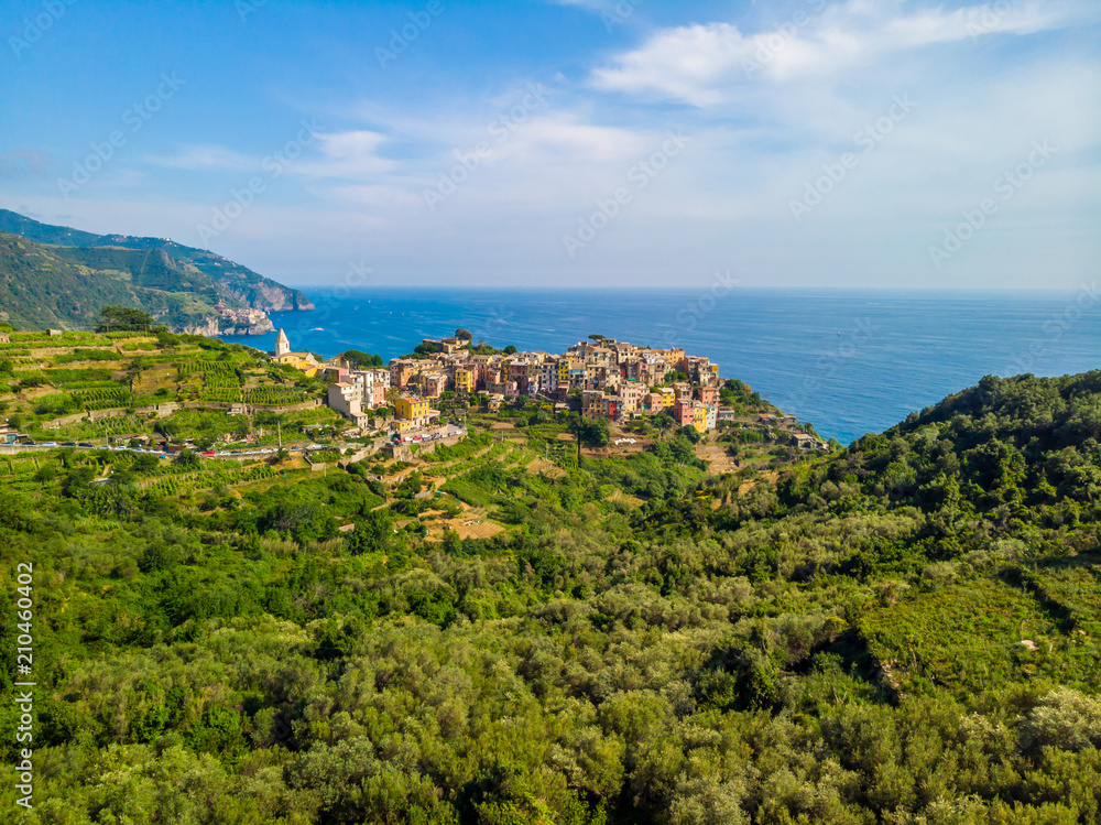 Corniglia - Village of Cinque Terre National Park at Coast of Italy. Province of La Spezia, Liguria, in the north of Italy - Aerial View - Travel destination and attractions in Europe.