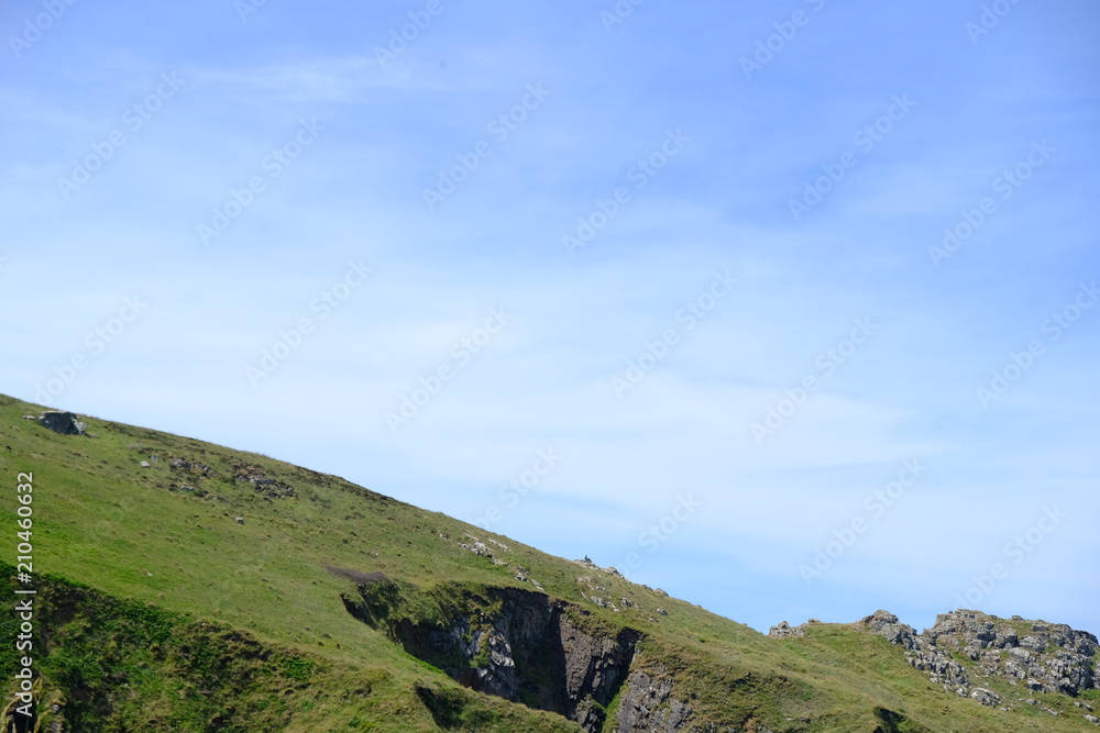 hill with blue sky
