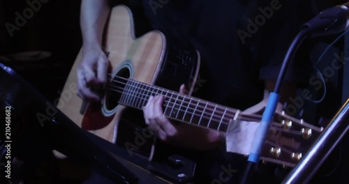 Musician in the restaurant. Bangkok, Thailand. musician play and sing the music for customer to come have dinner in the restaurant at night.