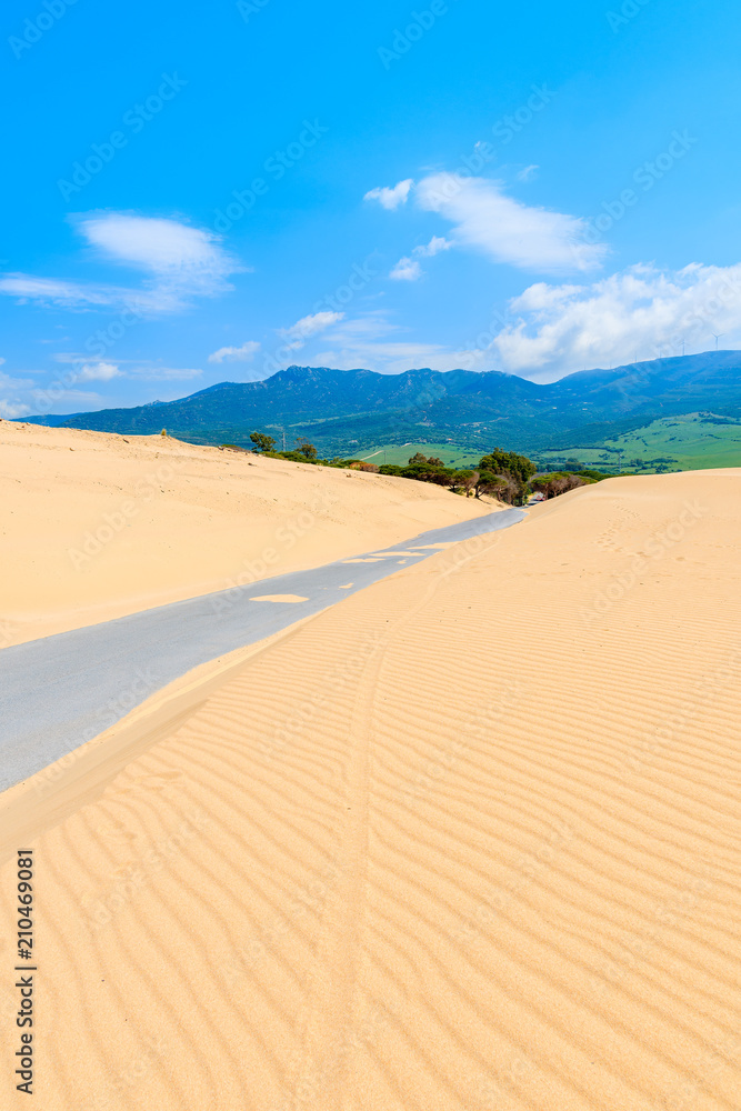 Road and sand dunes near Paloma beach, Costa de la Luz, Spain